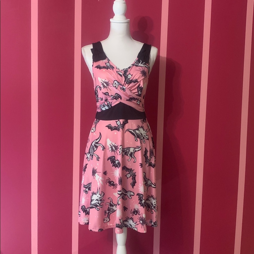 Pink and black dinosaur skeleton dress. Perfect for Halloween!